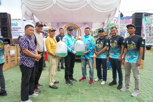 Lepas Ribuan Benih Ikan di Kuantan, Bupati Mengajak Jaga Ekosistem Sungai